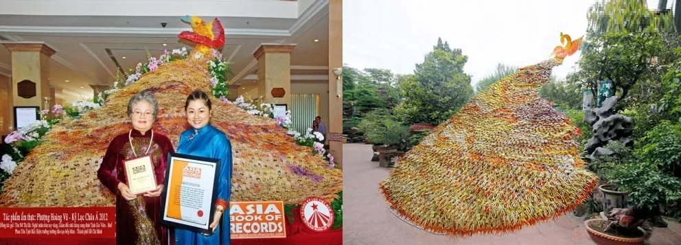 Nghệ nhân Tôn Nữ Thị Hà và con gái Phan Tôn Tịnh Hải bên cạnh tác phẩm "Phượng Hoàng vũ" được công nhận kỷ lục Châu Á
